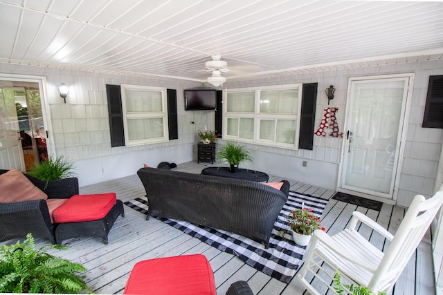 1602 27th St, Haleyville, AL 35565 - wooden deck with a ceiling fan