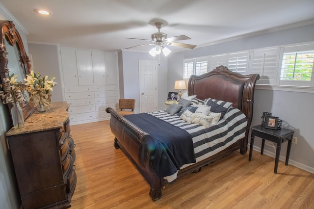 1602 27th St, Haleyville, AL 35565 - bedroom featuring light wood-style flooring, multiple windows, crown molding, ceiling fan, and recessed lighting