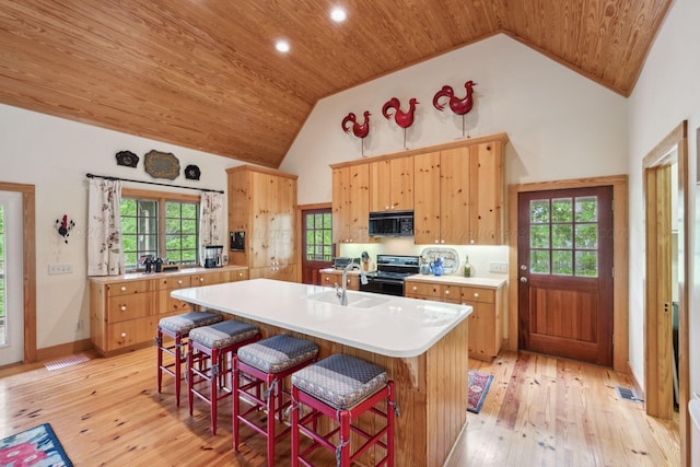 1617 S Stoney Rd, Double Springs, AL 35553 - kitchen featuring black appliances, a sink, wood ceiling, light countertops, and a kitchen island with sink