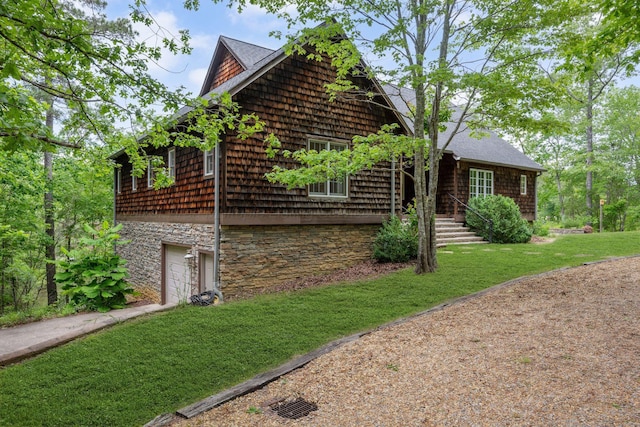 1617 S Stoney Rd, Double Springs, AL 35553 - view of home's exterior with an attached garage and a yard