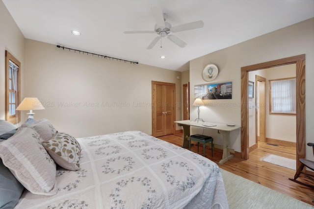 1617 S Stoney Rd, Double Springs, AL 35553 - bedroom featuring light wood finished floors, baseboards, recessed lighting, a ceiling fan, and a closet