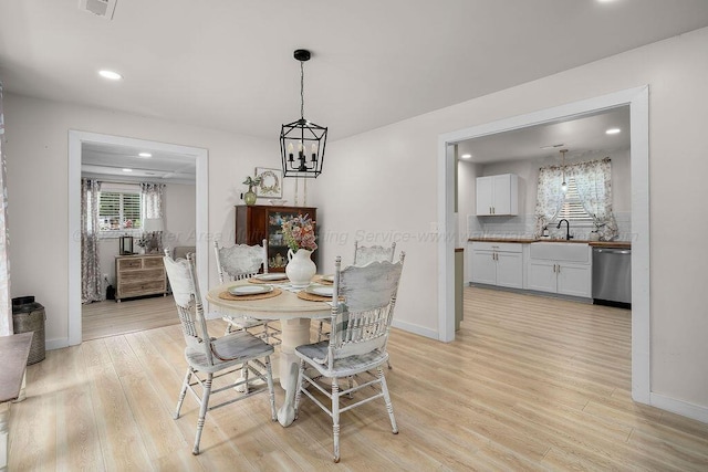 69 Oak Dr, Jasper, AL 35501 - dining area with light wood finished floors, recessed lighting, and a chandelier
