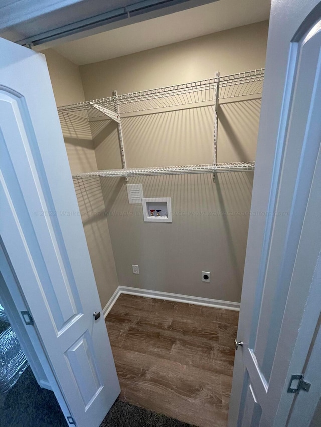 washroom featuring wood finished floors, electric dryer hookup, laundry area, and washer hookup