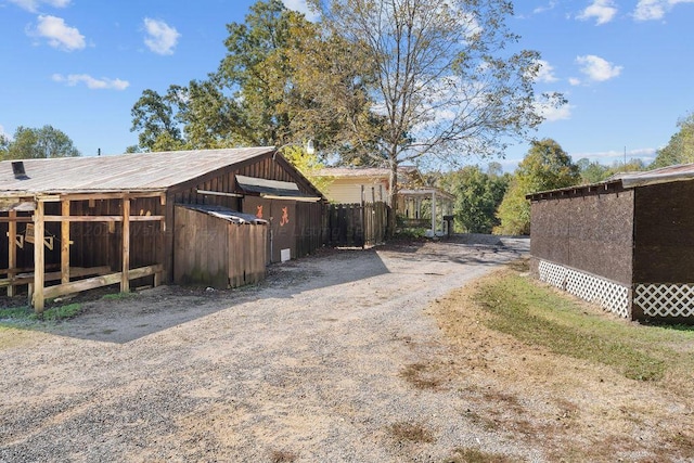 exterior space featuring an outbuilding