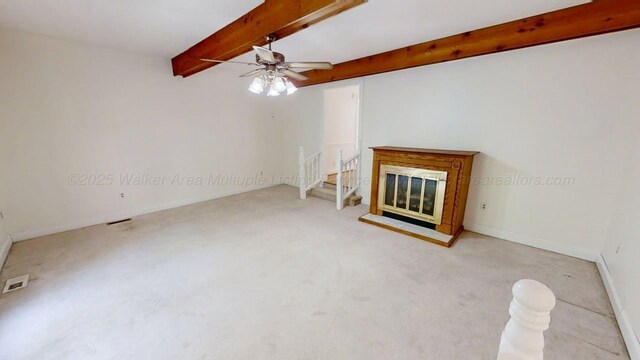1704 Sharon Ln, Jasper, AL 35504 - carpeted spare room featuring baseboards, a ceiling fan, beamed ceiling, and french doors