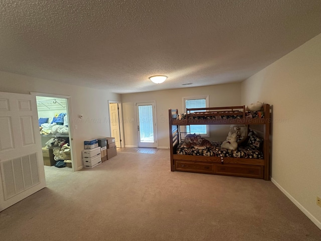 542 Llama Ln, Quinton, AL 35130 - bedroom featuring carpet flooring and a textured ceiling