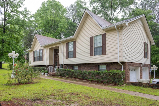 1925 Sharon Blvd, Dora, AL 35062 - raised ranch featuring an attached garage, a front yard, and brick siding