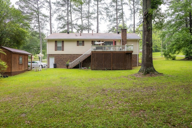 1925 Sharon Blvd, Dora, AL 35062 - rear view of property featuring stairway, a deck, a yard, and brick siding