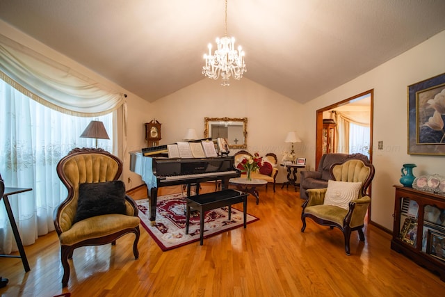 1925 Sharon Blvd, Dora, AL 35062 - sitting room with a chandelier, wood finished floors, lofted ceiling, and baseboards