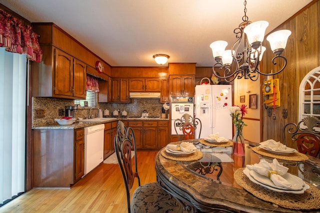 1925 Sharon Blvd, Dora, AL 35062 - kitchen featuring white appliances, a sink, a chandelier, light wood-style flooring, and under cabinet range hood