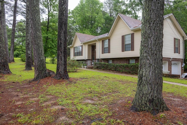 1925 Sharon Blvd, Dora, AL 35062 - split foyer home with a front lawn and a garage