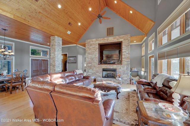 60 Sunset Dr, Arley, AL 35541 - living area featuring high vaulted ceiling, wooden ceiling, ceiling fan with notable chandelier, visible vents, and ornamental molding