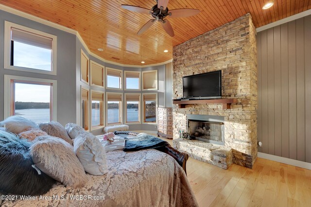 60 Sunset Dr, Arley, AL 35541 - bedroom featuring a fireplace, crown molding, wood finished floors, and wood ceiling