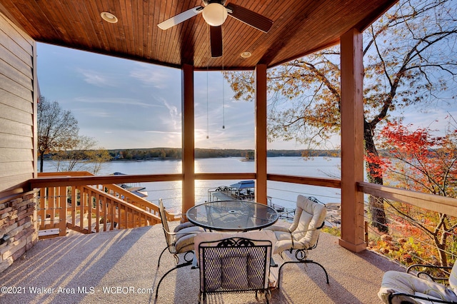 60 Sunset Dr, Arley, AL 35541 - wooden terrace with a water view, outdoor dining area, and a ceiling fan