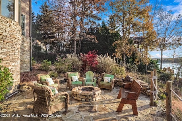 60 Sunset Dr, Arley, AL 35541 - view of patio / terrace featuring an outdoor fire pit and a water view