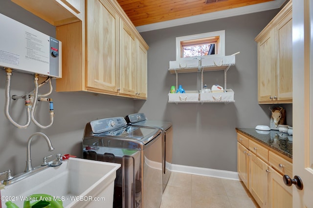 60 Sunset Dr, Arley, AL 35541 - laundry area with a sink, light tile patterned floors, independent washer and dryer, cabinet space, and ornamental molding