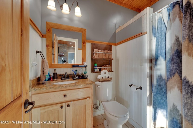 60 Sunset Dr, Arley, AL 35541 - bathroom with tile patterned floors, curtained shower, toilet, and vanity