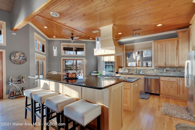 60 Sunset Dr, Arley, AL 35541 - kitchen with a kitchen island, wooden ceiling, light brown cabinetry, and stainless steel appliances