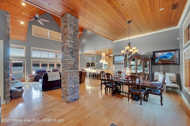 60 Sunset Dr, Arley, AL 35541 - dining area with ornate columns, high vaulted ceiling, wood ceiling, and hardwood / wood-style floors