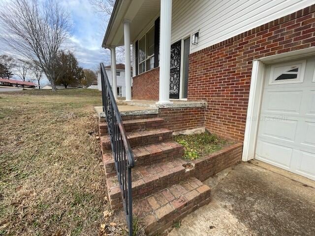 exterior details featuring brick siding