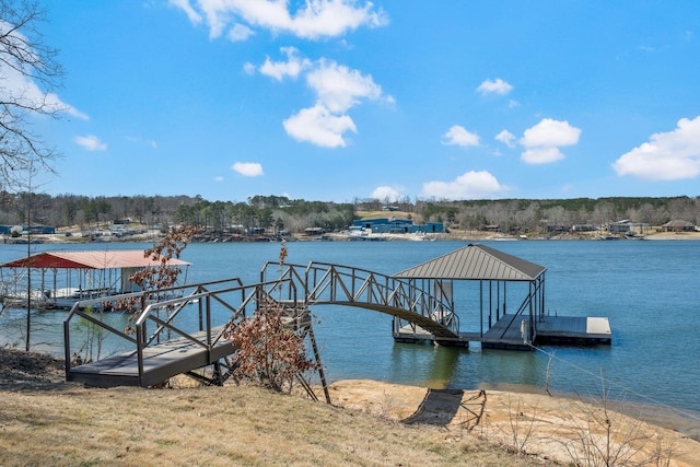 view of dock with a water view and boat lift