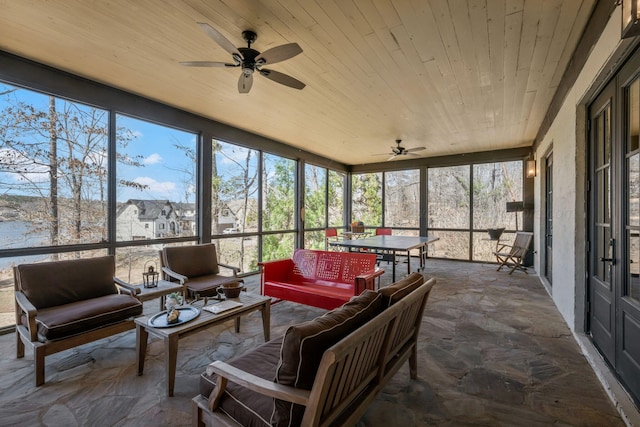 sunroom with an outdoor hangout area and ceiling fan