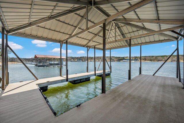 dock area featuring a water view