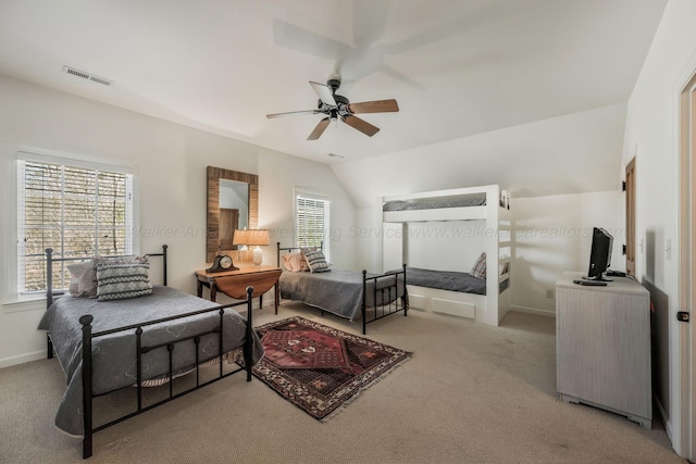 bedroom featuring baseboards, carpet flooring, and visible vents