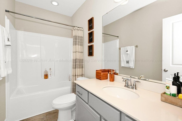 1502 NE Bailey Ct, Cullman, AL 35055 - full bathroom with toilet, vanity, and shower / bath combo
