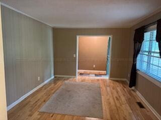 4407 Pineywoods Sipsey Rd, Jasper, AL 35504 - spare room with wood finished floors, baseboards, and crown molding
