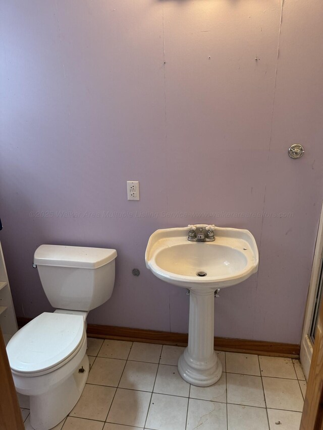 4407 Pineywoods Sipsey Rd, Jasper, AL 35504 - bathroom featuring toilet, baseboards, and tile patterned floors