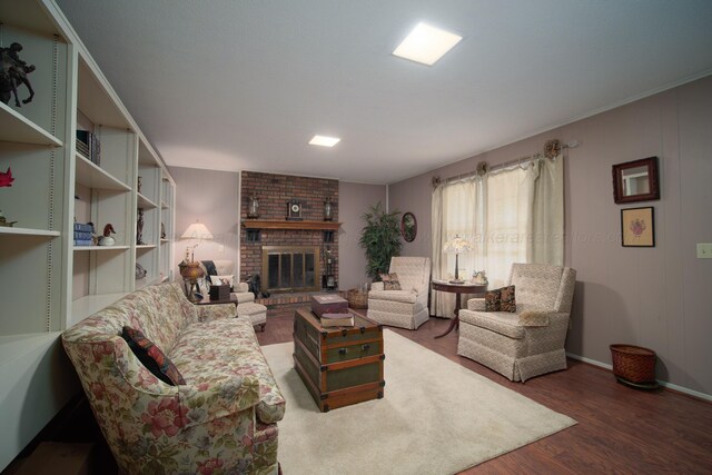 1004 Quarry Rd, Jasper, AL 35501 - living room with a brick fireplace and wood finished floors