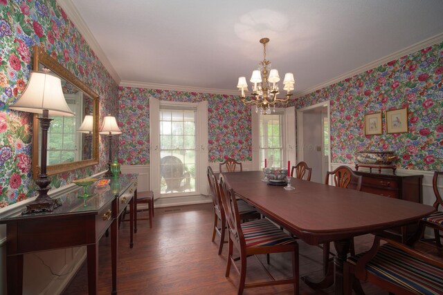 1004 Quarry Rd, Jasper, AL 35501 - dining area featuring wainscoting, a chandelier, wood finished floors, wallpapered walls, and crown molding