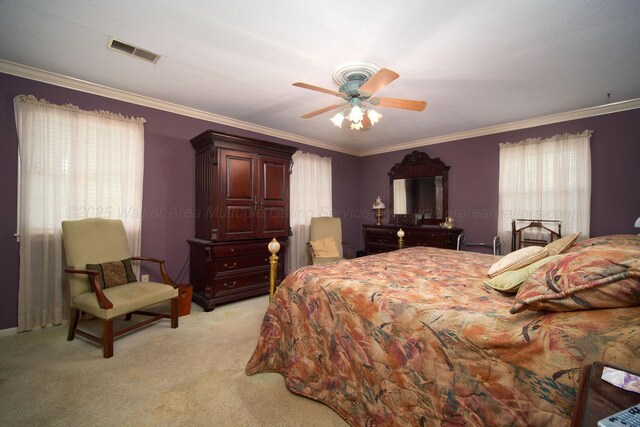 1004 Quarry Rd, Jasper, AL 35501 - bedroom featuring light carpet, crown molding, and a ceiling fan