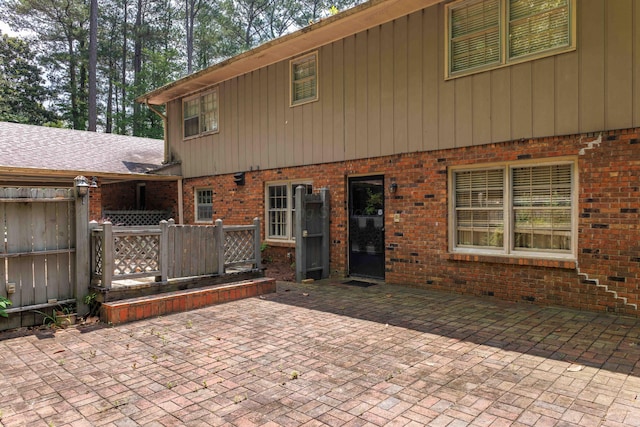 1004 Quarry Rd, Jasper, AL 35501 - back of property with brick siding and a patio area
