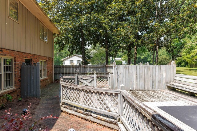 1004 Quarry Rd, Jasper, AL 35501 - wooden terrace with view of wooded area