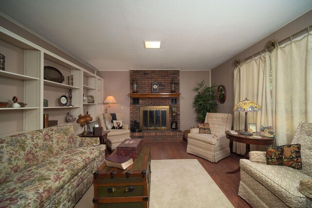 1004 Quarry Rd, Jasper, AL 35501 - living area with wood finished floors, a fireplace, and crown molding