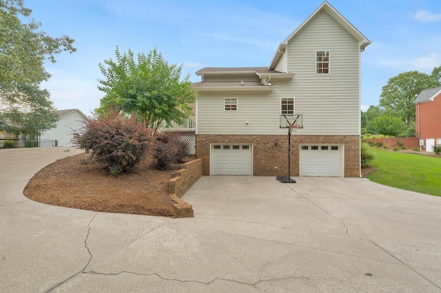 539 Hayfield Dr, Dora, AL 35062 - view of property exterior featuring concrete driveway, an attached garage, and brick siding