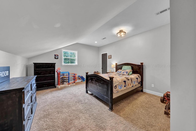 539 Hayfield Dr, Dora, AL 35062 - carpeted bedroom featuring vaulted ceiling and baseboards