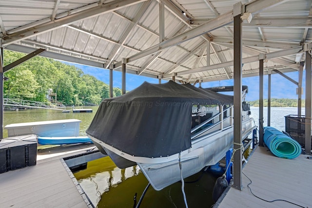 154 County Rd 389, Cullman, AL 35057 - dock area featuring boat lift, a water view, and view of wooded area