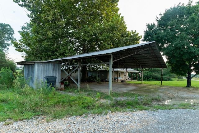 12 Dover Rd, Haleyville, AL 35565 - view of parking featuring a detached carport and driveway