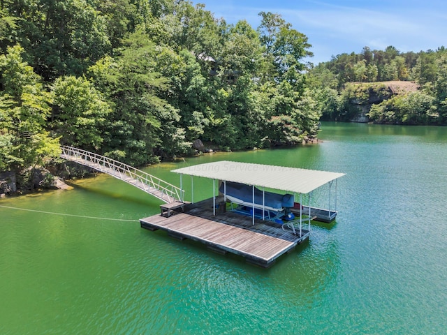 dock area featuring a water view and boat lift