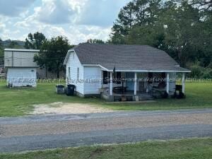 752 12th Ave E, Guin, AL 35563 - view of outbuilding with covered porch