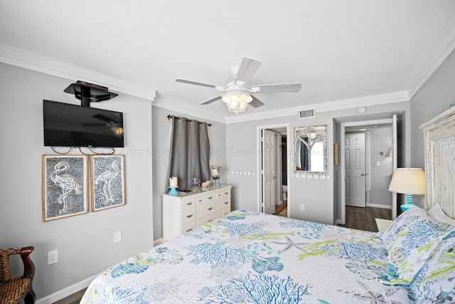 bedroom featuring crown molding, wood finished floors, ceiling fan, and baseboards