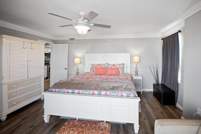 bedroom featuring ornamental molding, dark wood finished floors, baseboards, and a ceiling fan