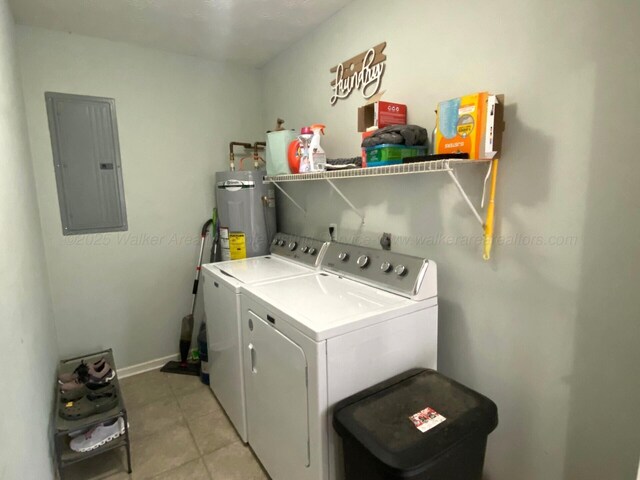 164 County Road 1636, Cullman, AL 35058 - washroom featuring electric panel, water heater, washer and clothes dryer, and light tile patterned floors