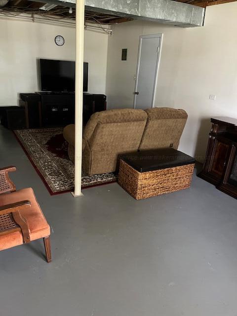 915 County Highway 4, Winfield, AL 35594 - living room featuring finished concrete flooring