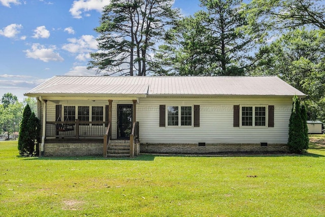 ranch-style home featuring a front yard and covered porch