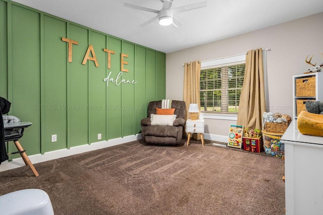 living area with carpet floors and ceiling fan