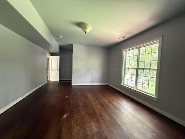 1068 Old Zion Loop, Nauvoo, AL 35578 - empty room featuring baseboards and dark wood finished floors